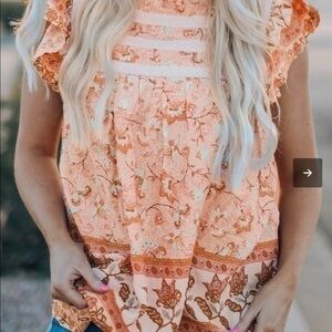 Orange Floral Print Ruffled Crew Neck Sleeveless Top